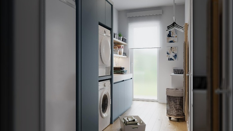 Slate blue laundry room cabinets