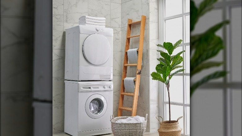 Marble tiled wall laundry room