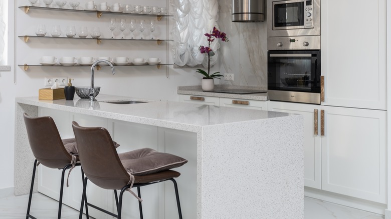 Grey speckled quartz waterfall countertop