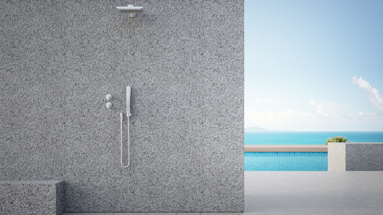 outdoor shower on concrete wall