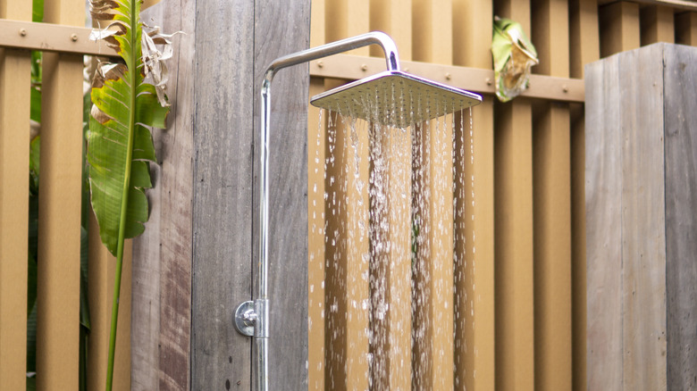 outdoor shower on fence