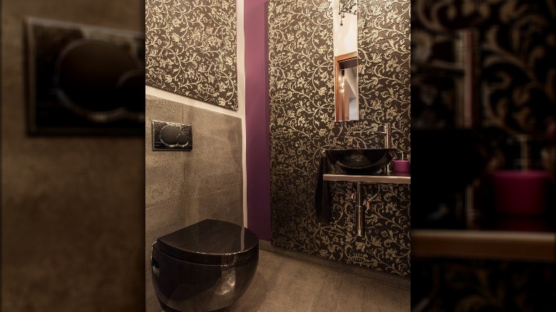 Dark bathroom small purple sliver