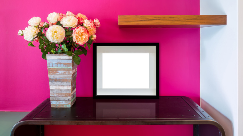 fuchsia wall behind desk