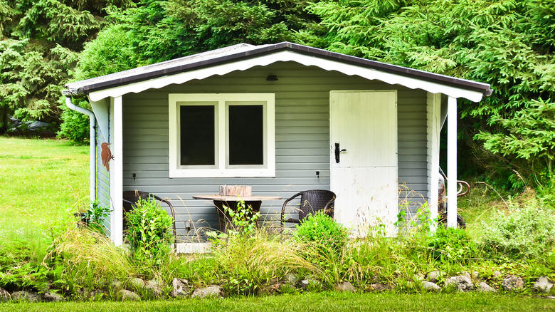 cabin with grassy garden