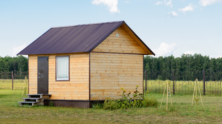 simple light wood small cabin