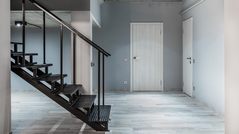 Staircase with doors in apartment