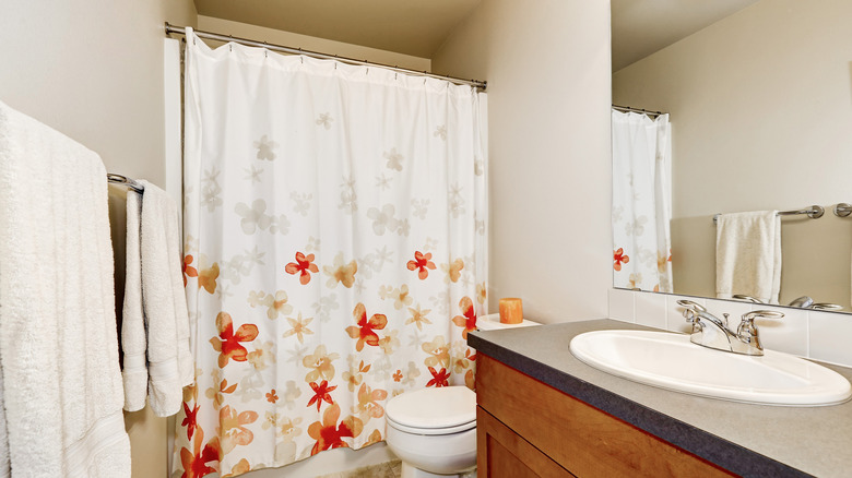 shower curtain with bright flowers