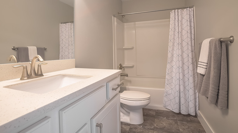 geometric shower curtain in bathroom