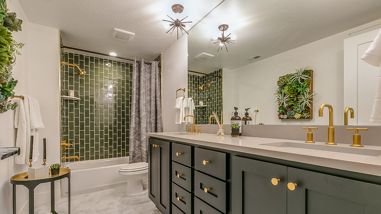 eclectic bathroom with green subway