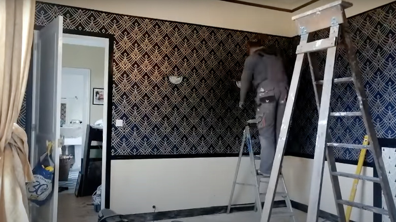 Art Deco wallpaper being installed