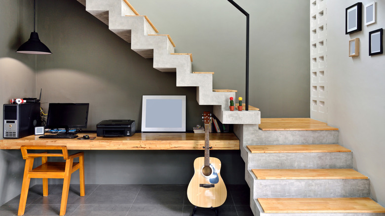 loft-style staircase with desk