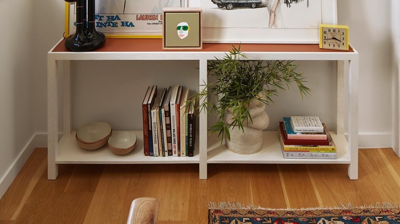 stairway landing shelf and art