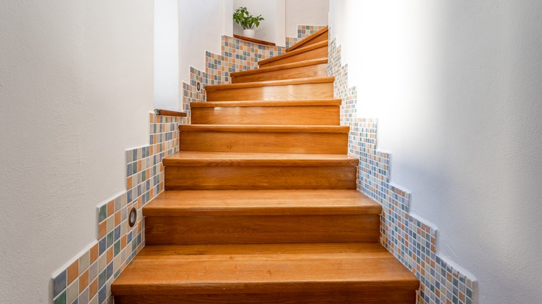 tiles on wooden stairs wall