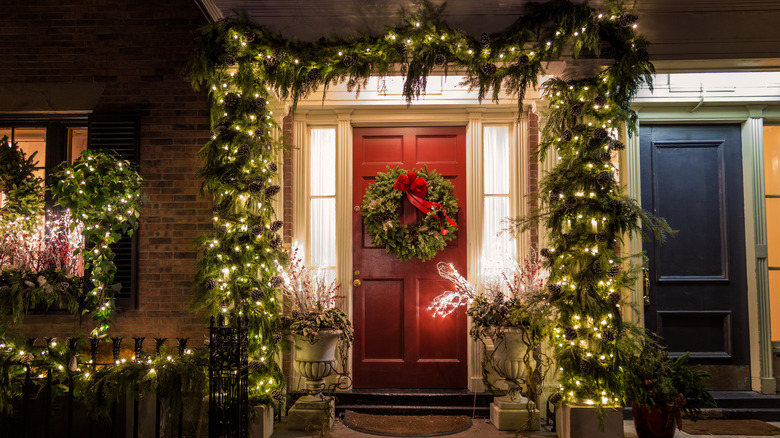 Townhome door with lighted garland