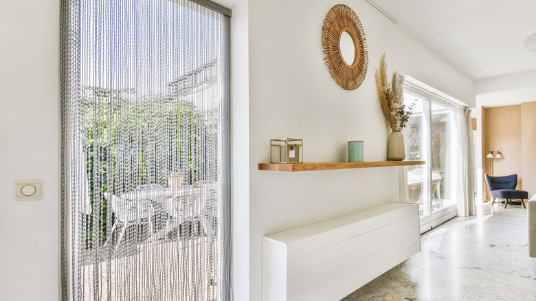 Window with a bead curtain