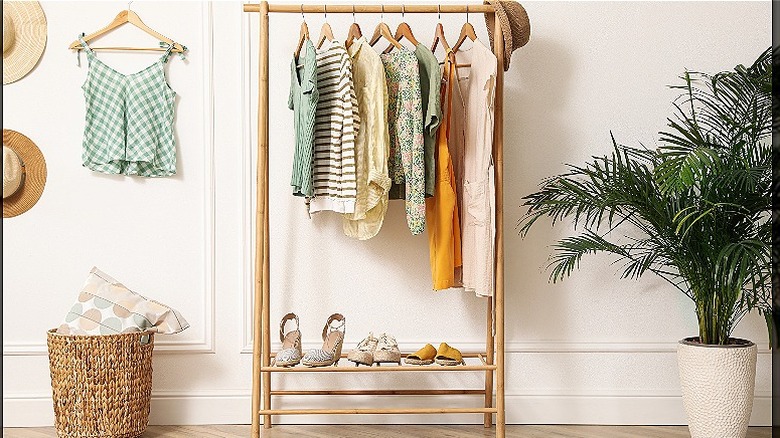 clothes hanging inside a rack