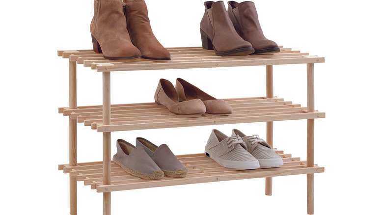 shoes on wooden shoe rack