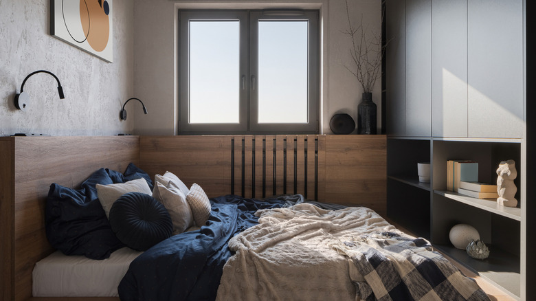 Blue bedding in gray room