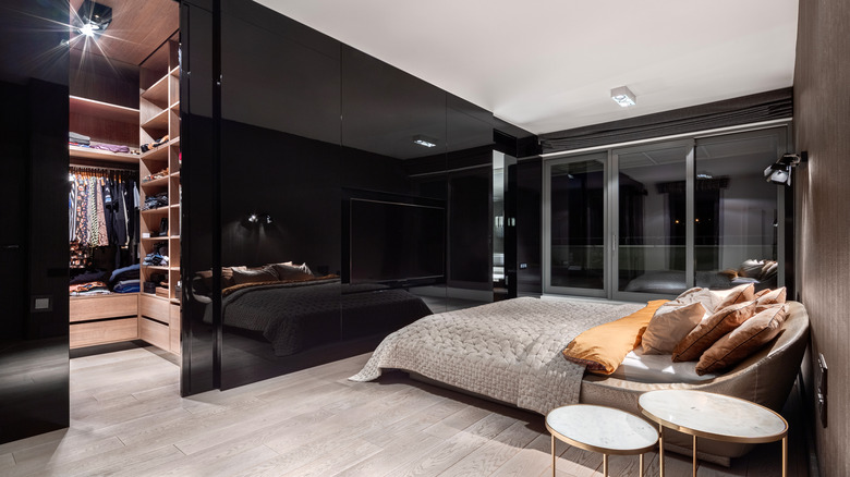 Black bedroom with white bedding