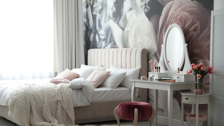 White bedroom with floral wall