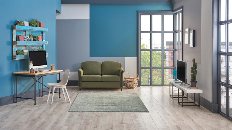 A living room in aqua and gray