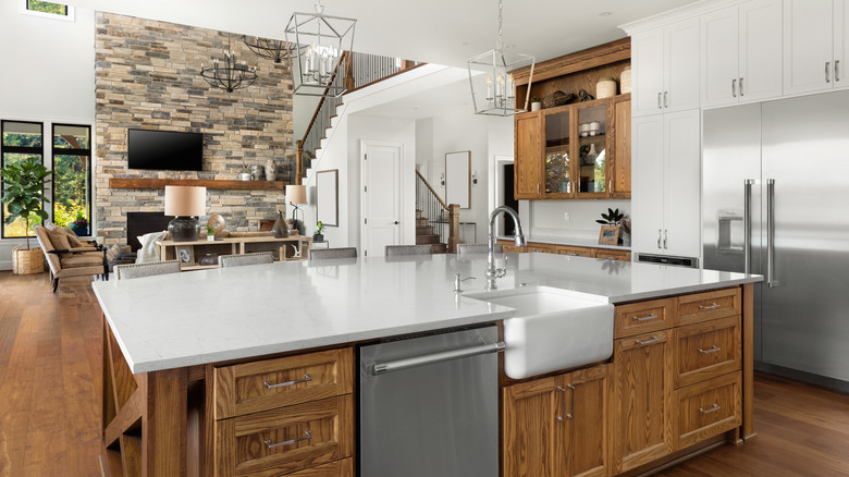 Stone fireplace and farmhouse sink