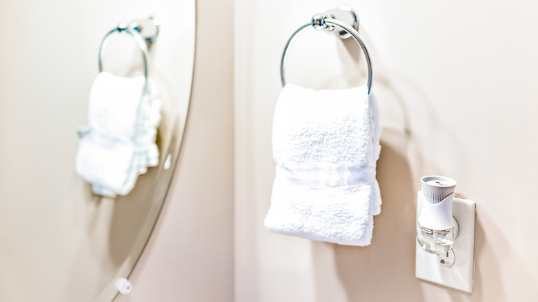 Plug-in air freshener in bathroom