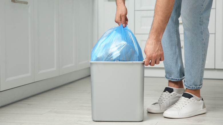 Man taking out trash