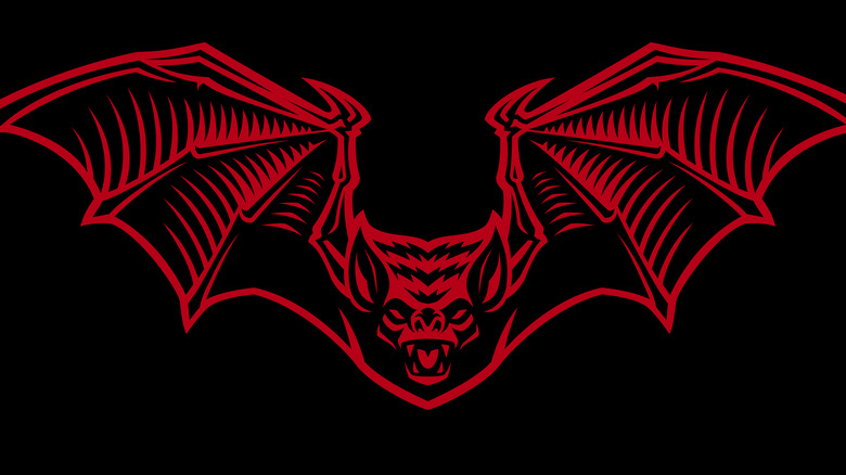 red bat on black background