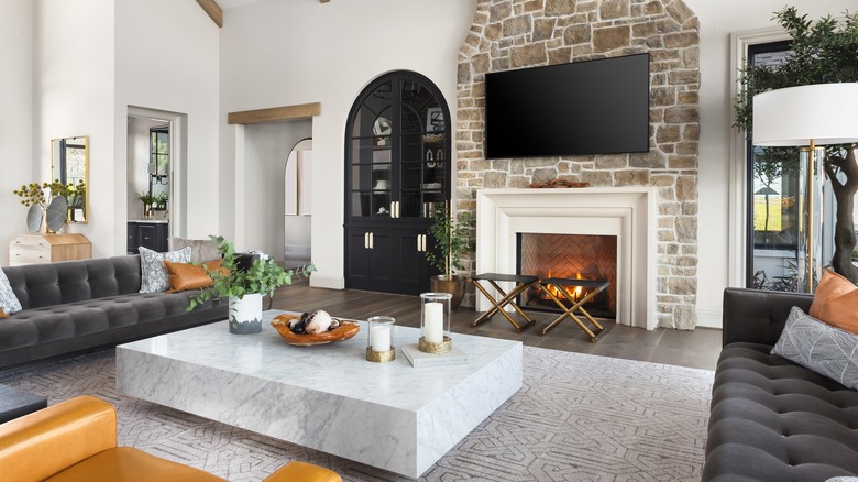 Living room with stone fireplace