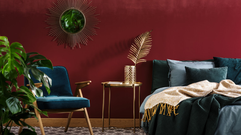 Red wall with gold accent decor