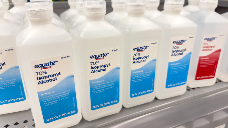 Bottles of isopropyl alcohol sitting on supermarket shelf