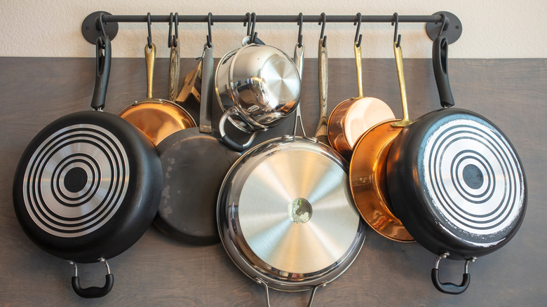 Pans hung vertically