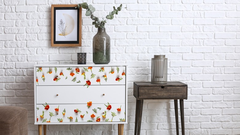 Dresser with wallpaper