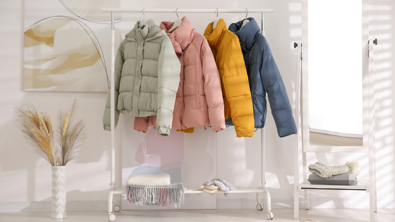 white clothes rack with coats