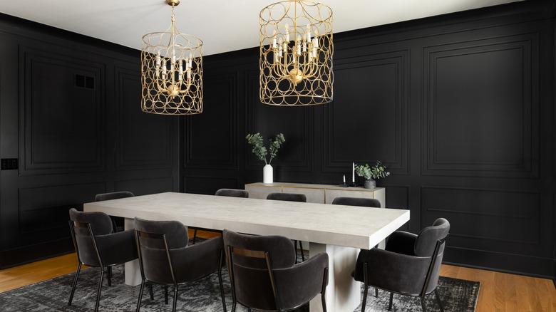 Dark dining room with black walls