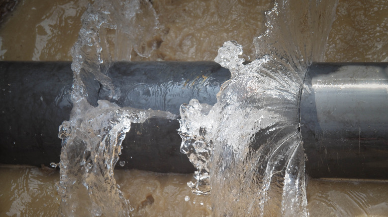 water spraying out of pipe