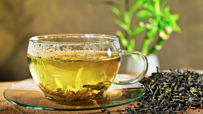 Glass mug with loose tea