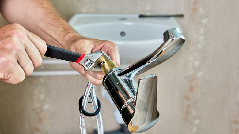 faucet installation with wrench