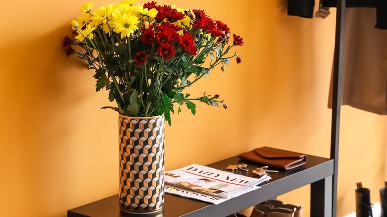 big vase on small table