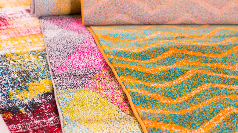 Pile of colorful rugs