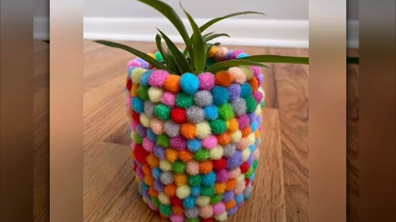 pom poms covering planter