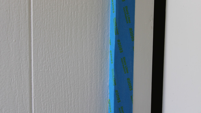 Tape along door trim