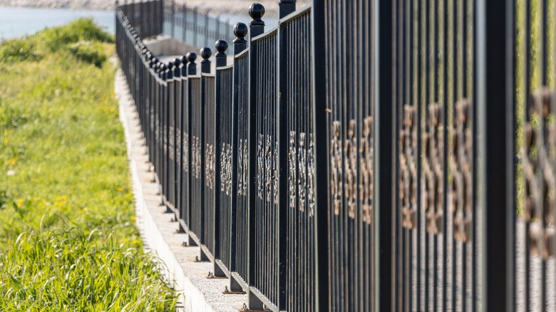 Aluminum fence edging stream