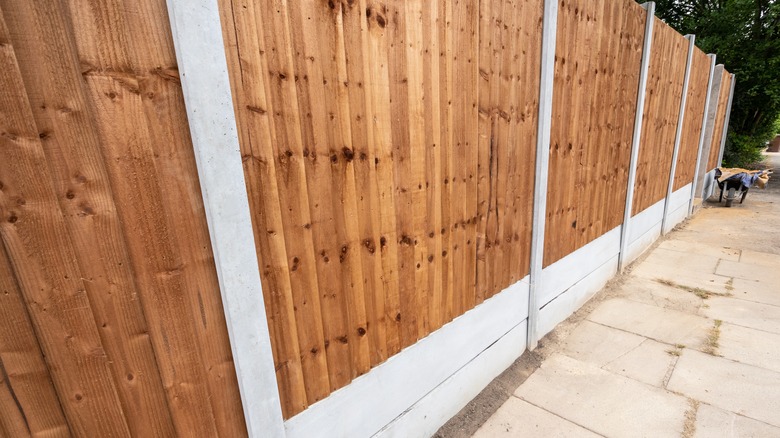 Concrete and wooden fence