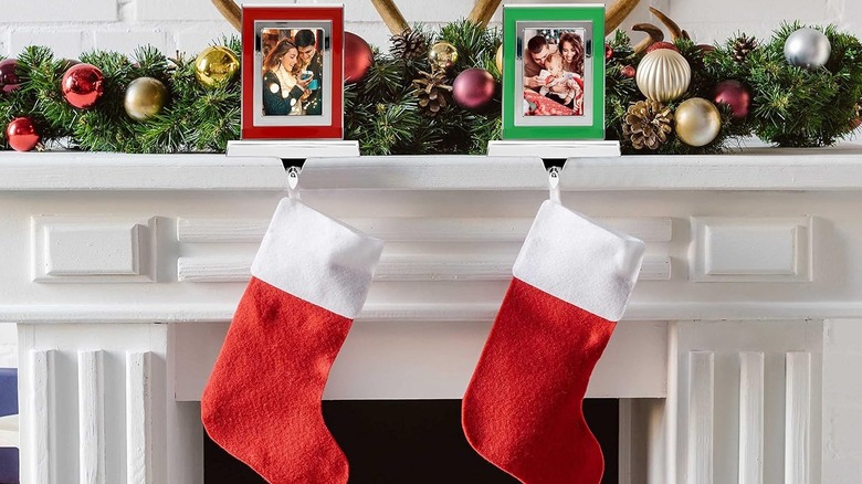 Picture frame stocking holders on mantel