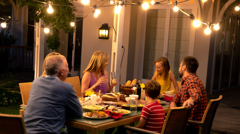 string lights by dinner patio