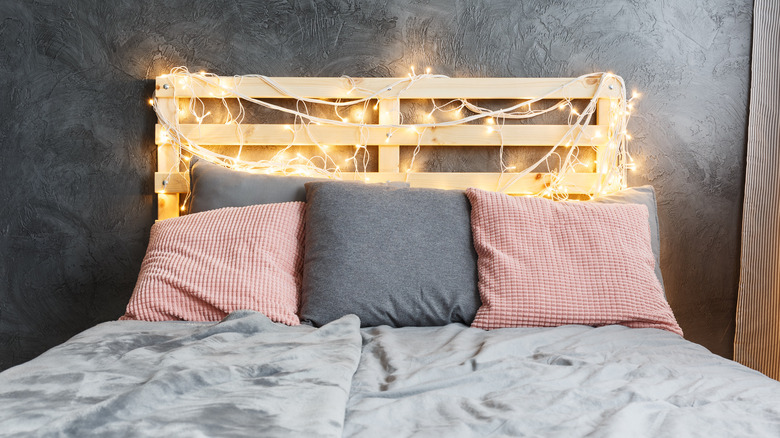 Palette headboard with lights