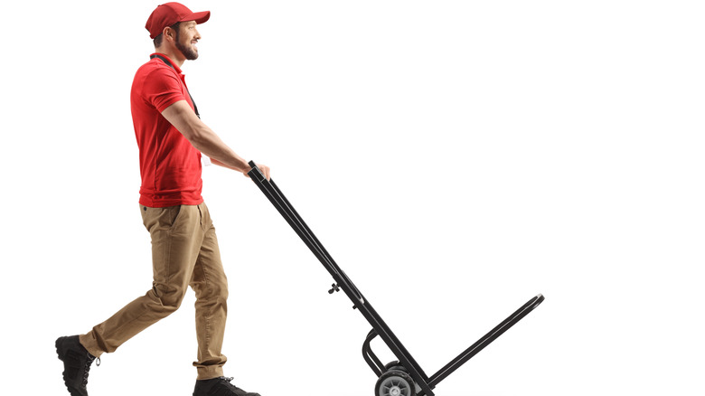 man with a hand truck