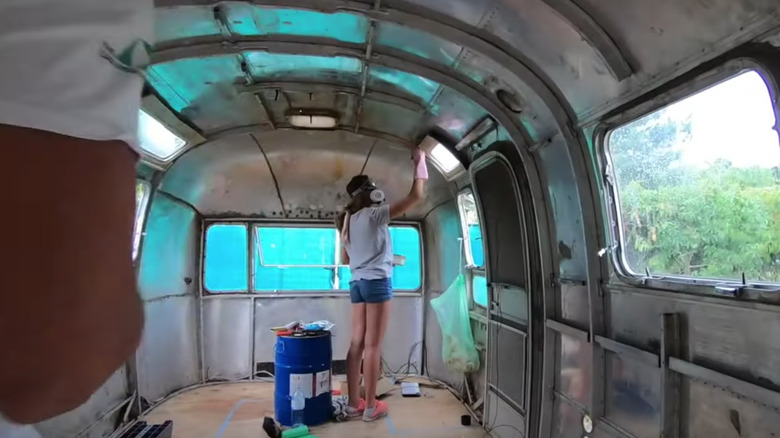 woman working on Airstream renovation